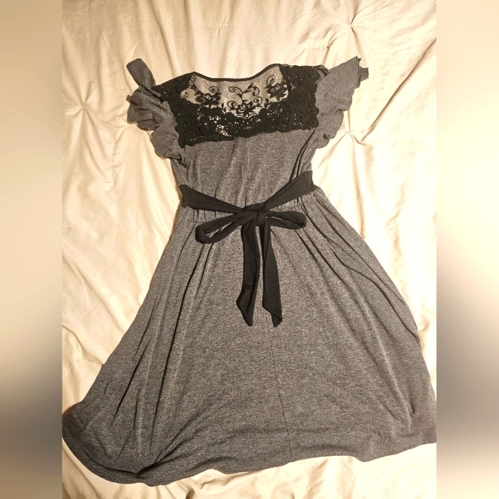 Gray dress with black lace pattern on back